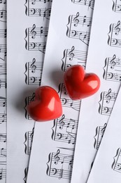 Heart figures on musical note sheets, top view