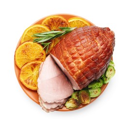 Christmas food. Tasty baked ham, oranges and vegetables isolated on white, top view