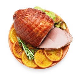 Christmas food. Tasty baked ham, oranges and vegetables isolated on white, top view