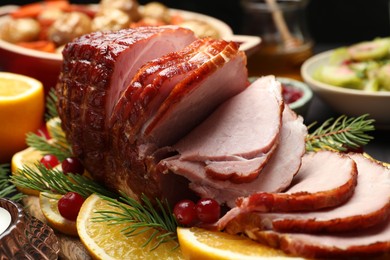 Tasty baked ham served on table, closeup