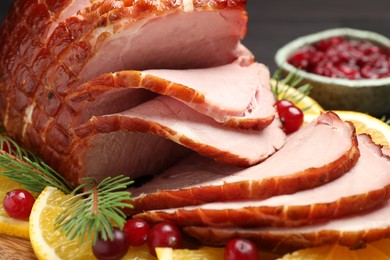 Photo of Tasty baked ham served on table, closeup