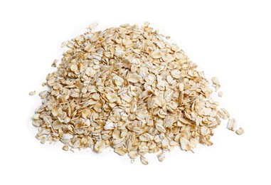 Photo of Many dry oat flakes isolated on white