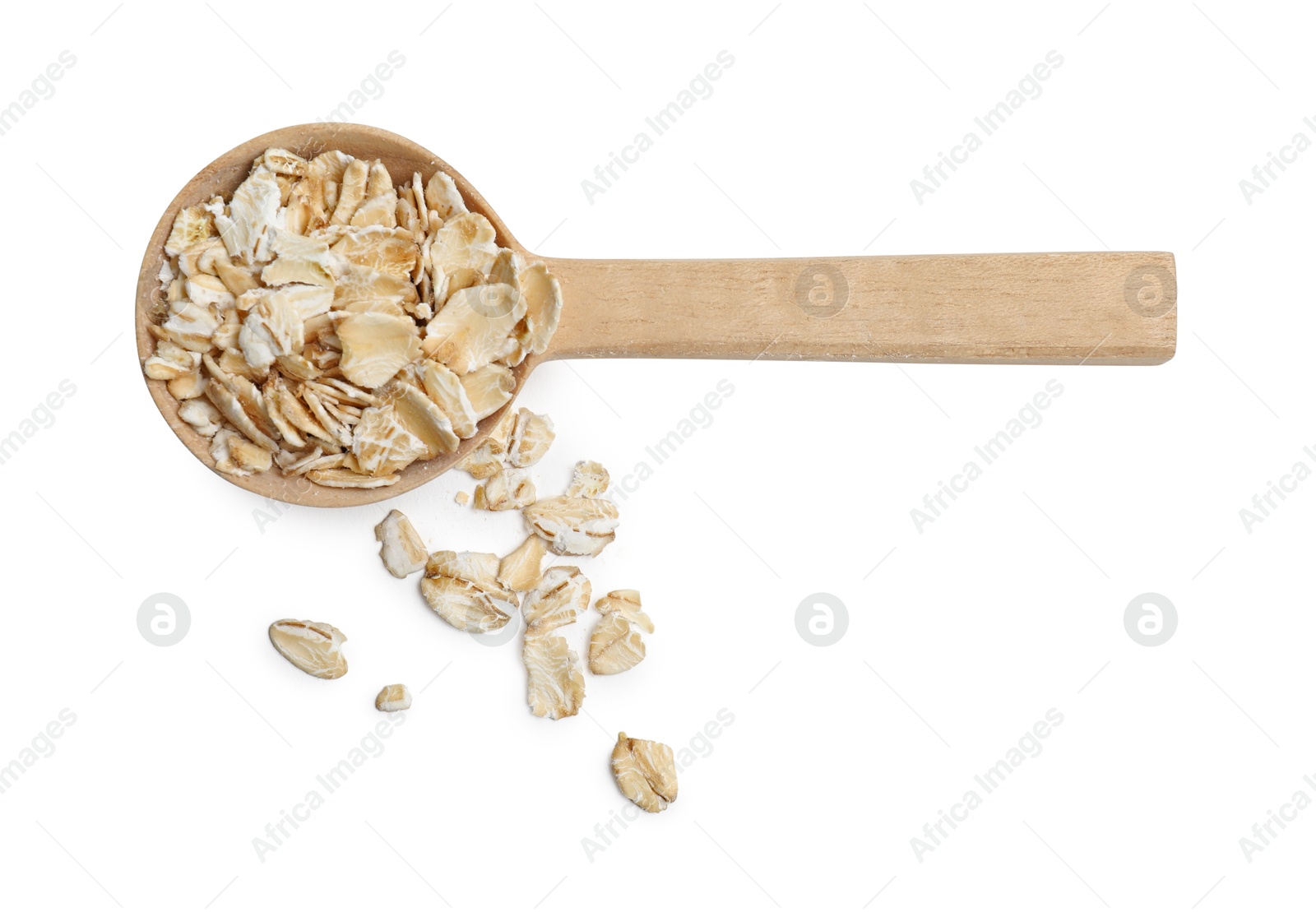 Photo of Oat flakes in spoon isolated on white, top view