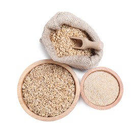 Photo of Sack with oat grains, bran in bowl and scoop isolated on white, top view