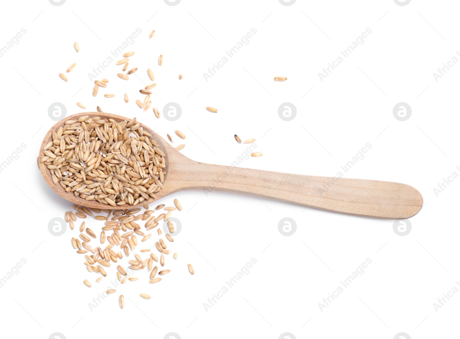 Photo of Oat grains in spoon isolated on white, top view