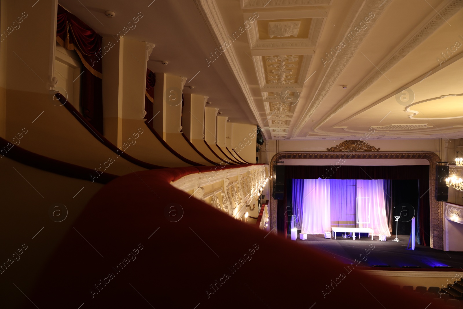 Photo of Different furniture and other decor on stage in theatre