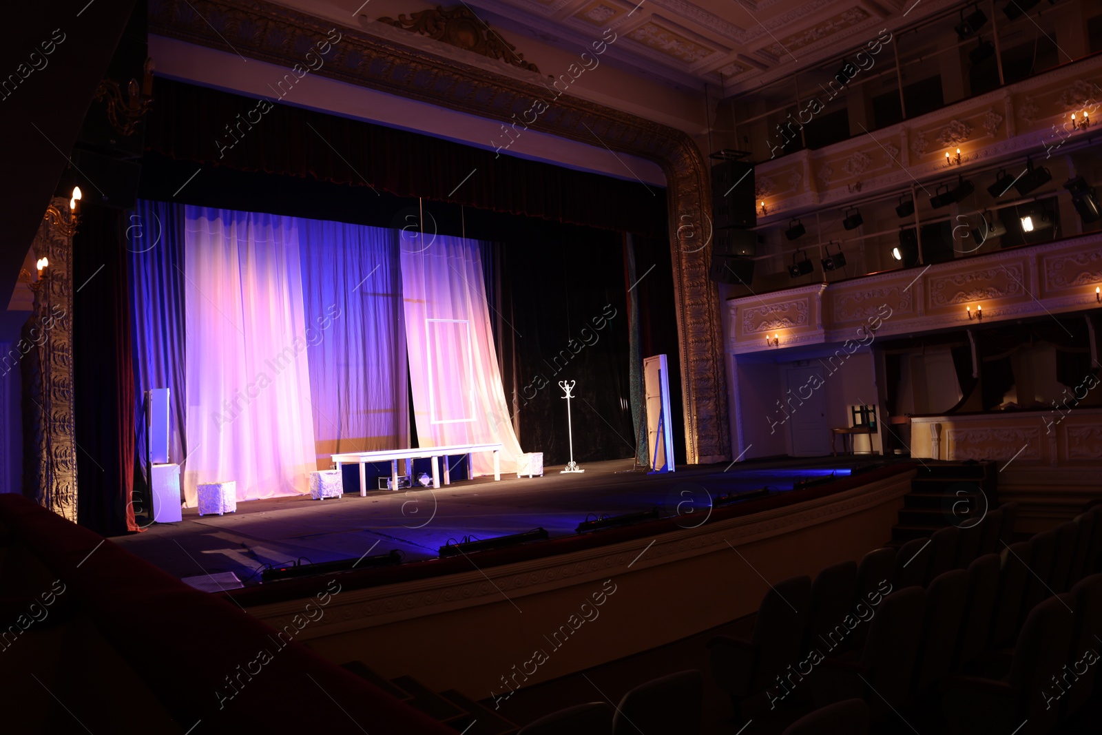 Photo of Different furniture and other decor on stage in theatre