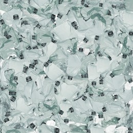 Image of Many used crumpled plastic bottles as background