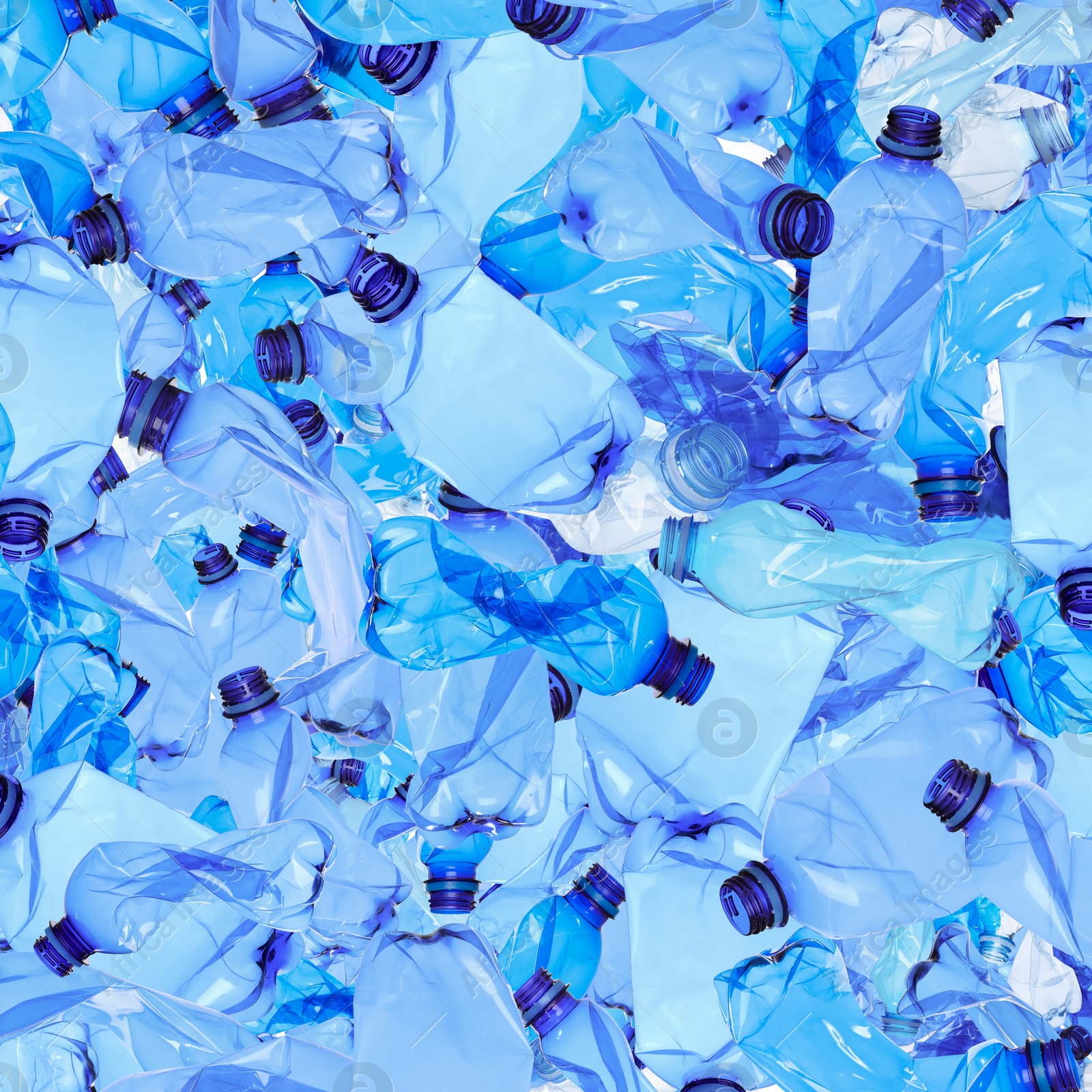 Image of Many used crumpled plastic bottles as background