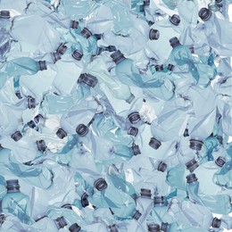 Many used crumpled plastic bottles as background