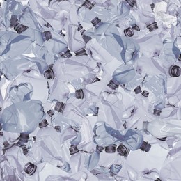 Image of Many used crumpled plastic bottles as background