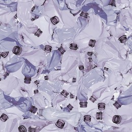 Image of Many used crumpled plastic bottles as background