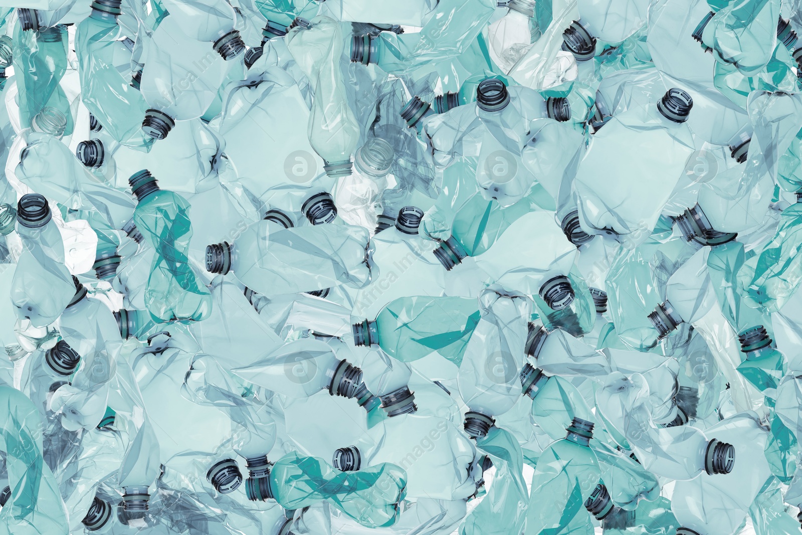 Image of Many used crumpled plastic bottles as background