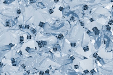 Image of Many used crumpled plastic bottles as background