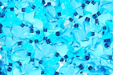 Image of Many used crumpled plastic bottles as background