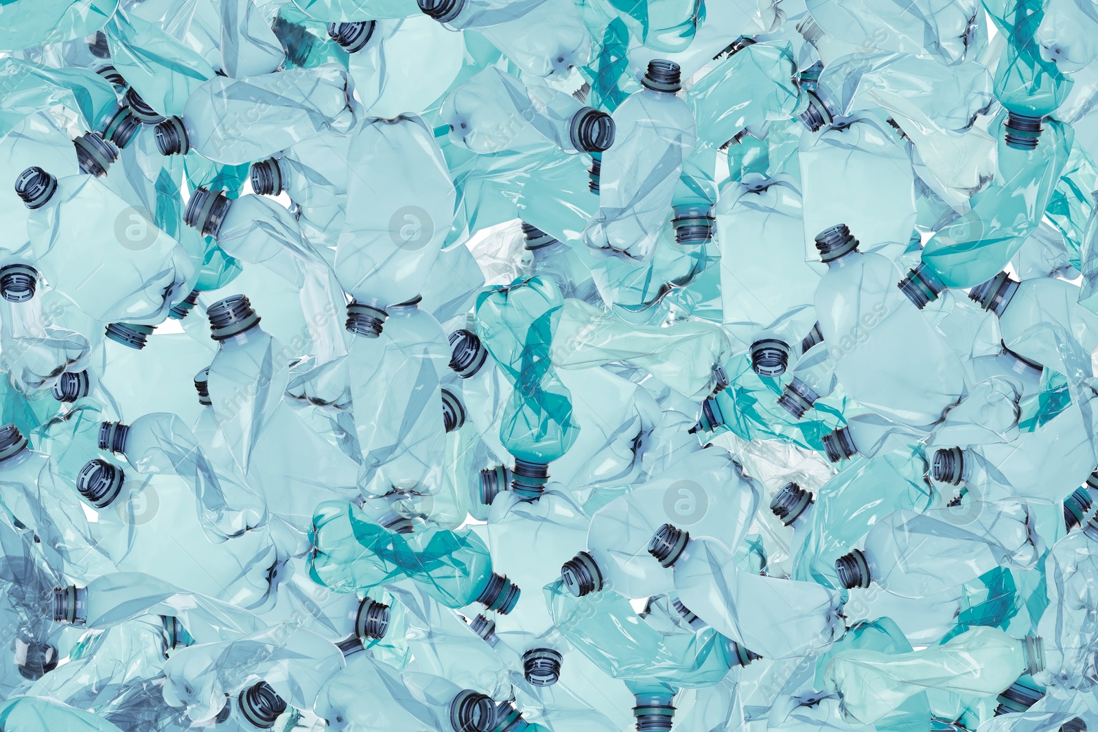 Image of Many used crumpled plastic bottles as background