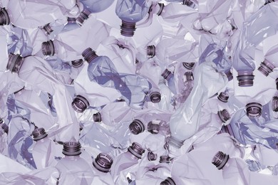 Image of Many used crumpled plastic bottles as background