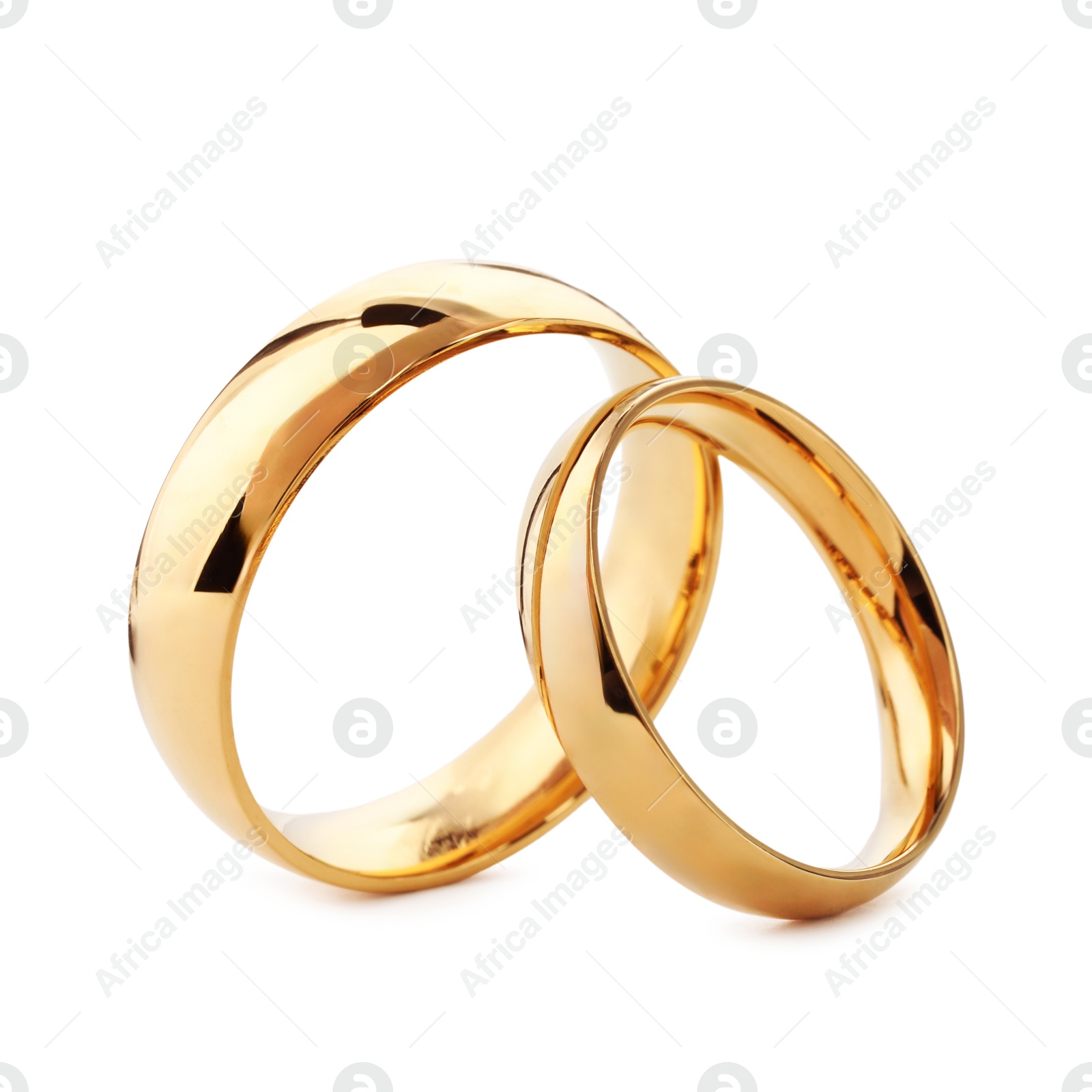 Photo of Beautiful golden wedding rings isolated on white