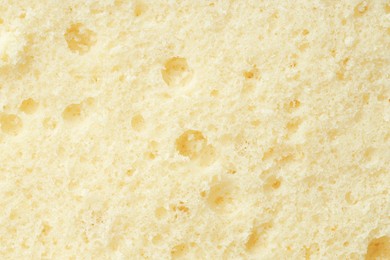 Tasty sponge cake as background, top view