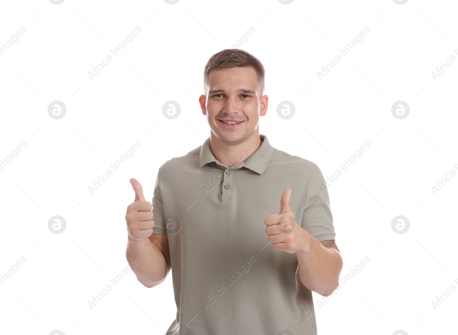 Photo of Happy winner showing thumbs up on white background