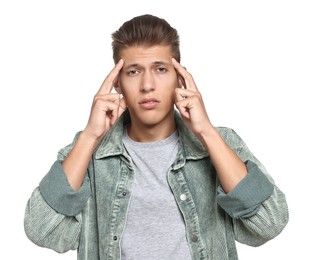 Tired student having stress before exam on white background