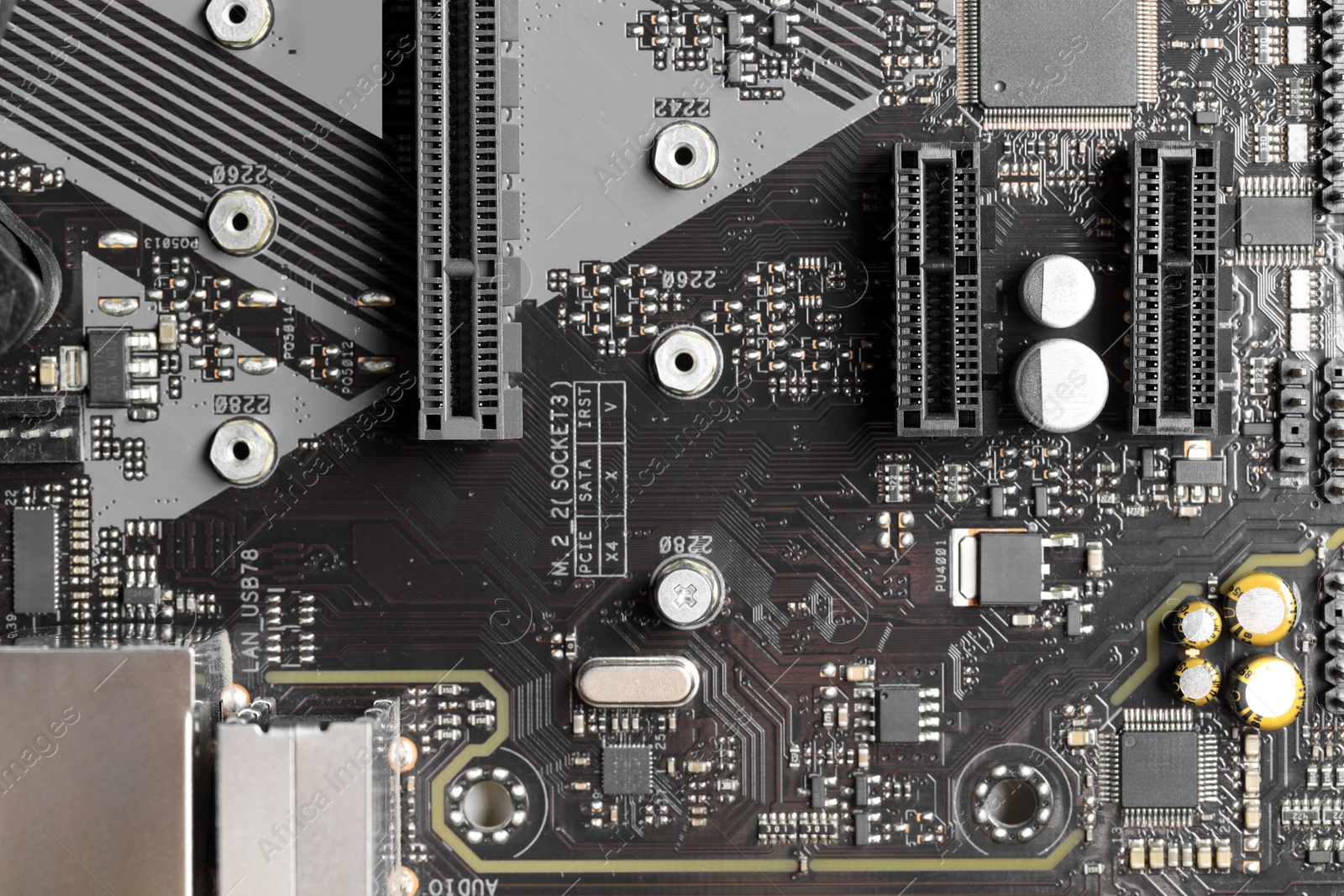 Photo of Computer motherboard as background, top view. Electronic engineering