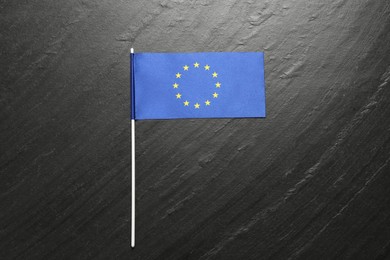 Photo of Flag of European Union on black textured background, top view