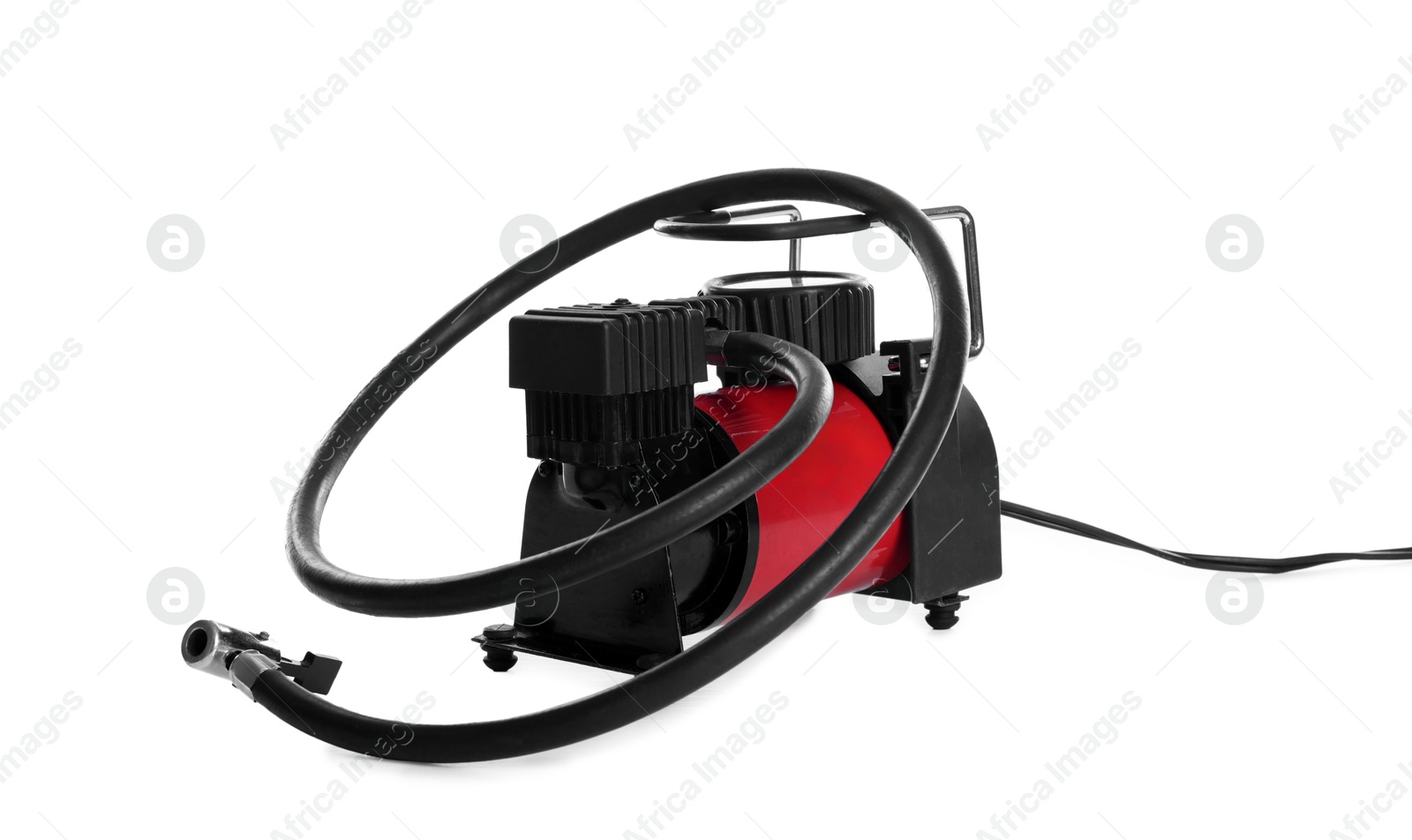 Photo of Air compressor with hose isolated on white