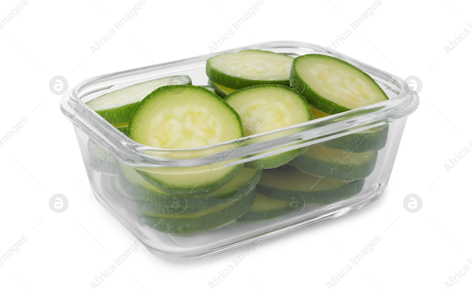 Photo of Slices of frozen zucchini in container isolated on white