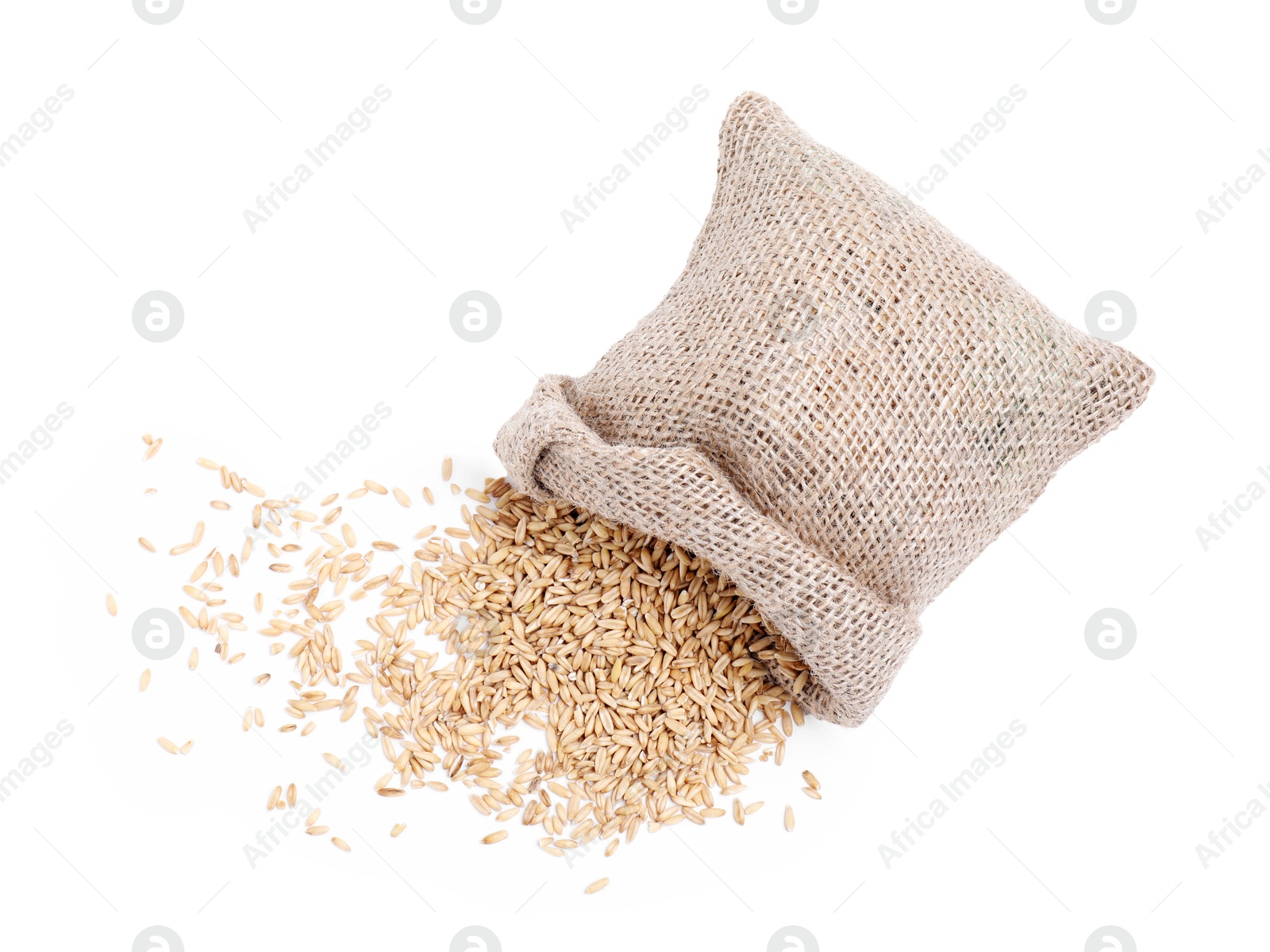 Photo of Overturned sack with oat grains isolated on white, top view