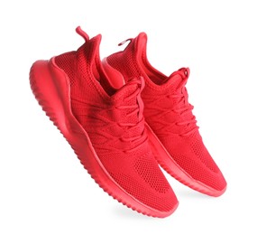 Photo of Pair of stylish red sneakers isolated on white