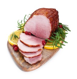 Christmas food. Tasty baked ham, oranges and cranberries isolated on white