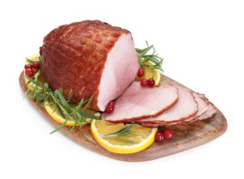 Christmas food. Tasty baked ham, oranges and cranberries isolated on white