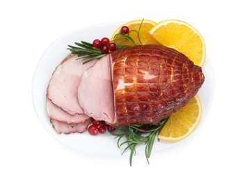 Photo of Christmas food. Tasty baked ham, oranges and cranberries isolated on white, top view