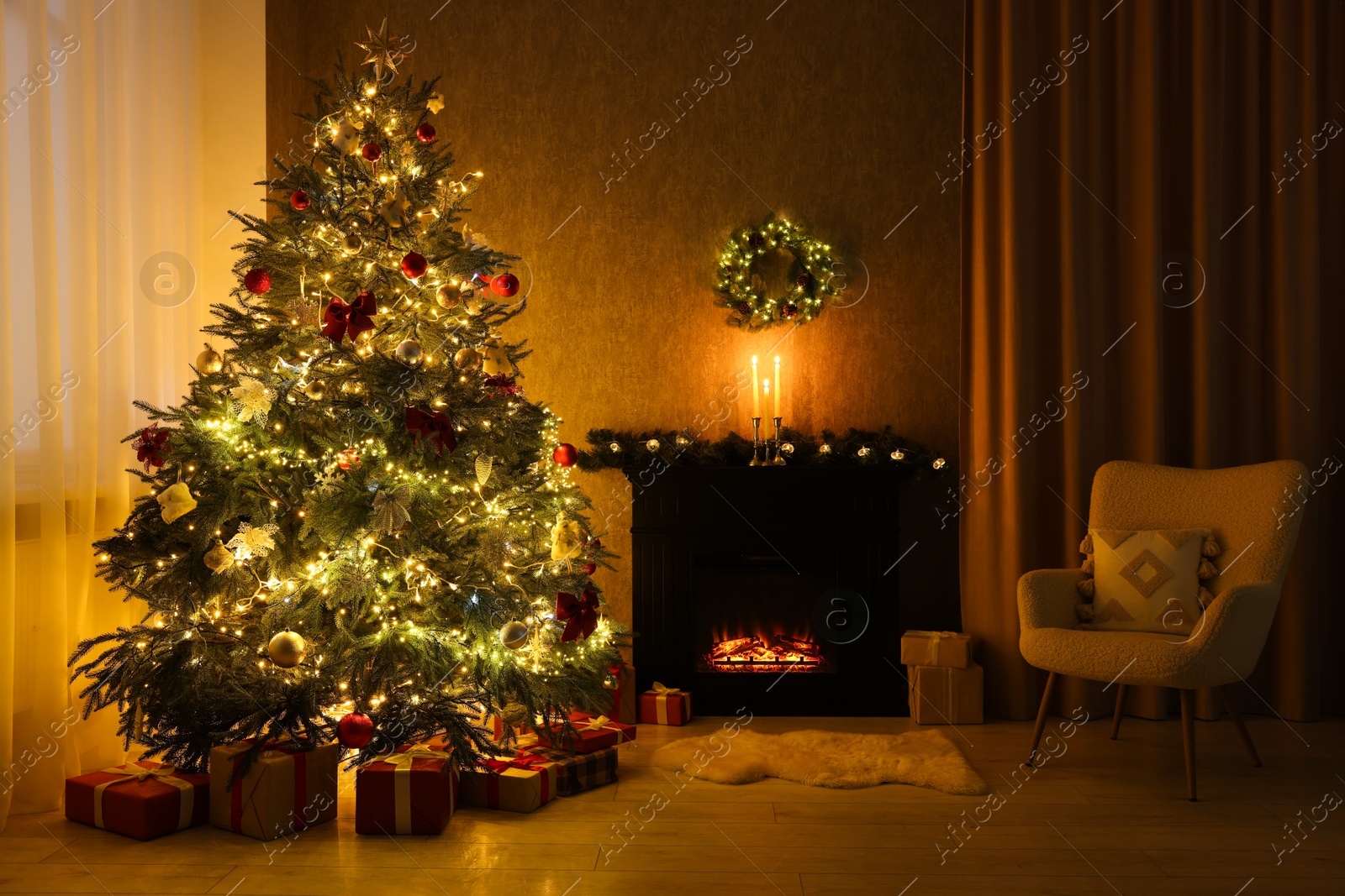 Photo of Cozy room with Christmas tree, fireplace and armchair. Interior design for holiday