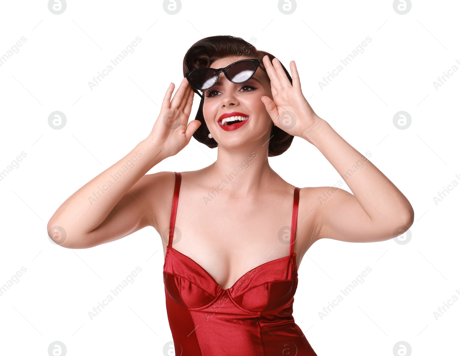 Photo of Pin-up woman in red underwear on white background