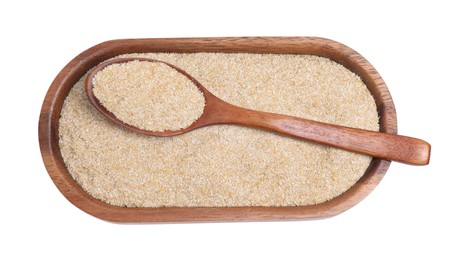 Oat bran and spoon isolated on white, top view