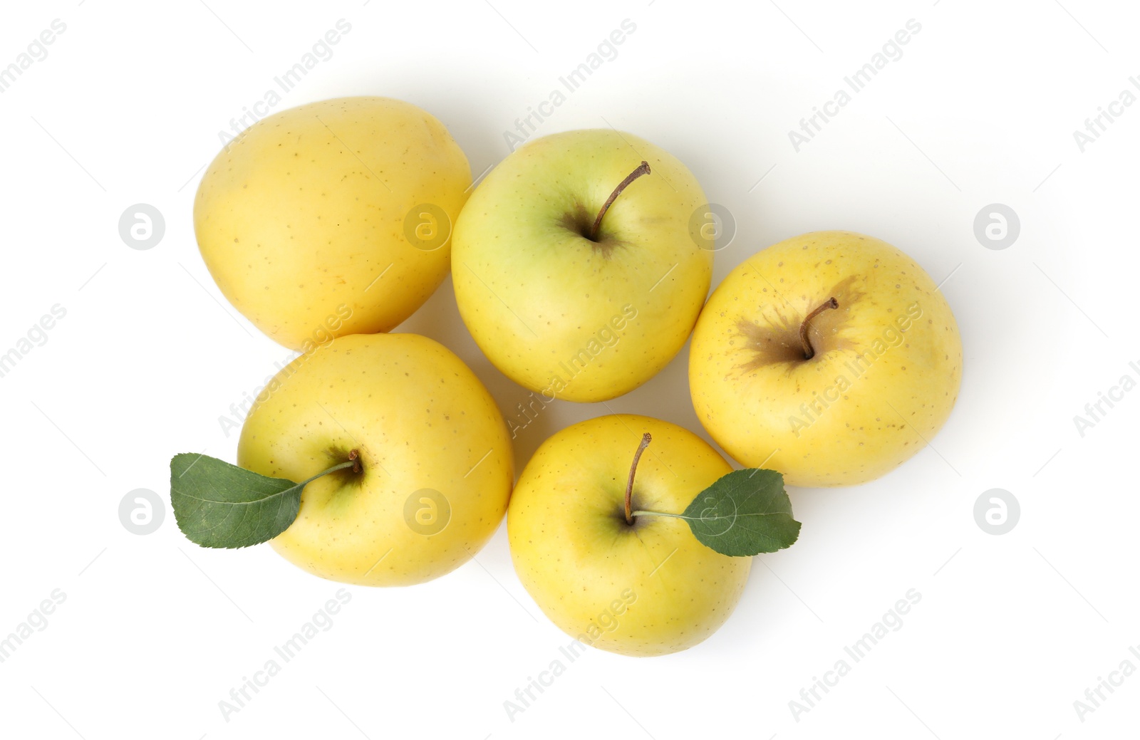 Photo of Many fresh yellow apples isolated on white, top view