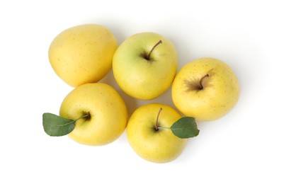 Many fresh yellow apples isolated on white, top view