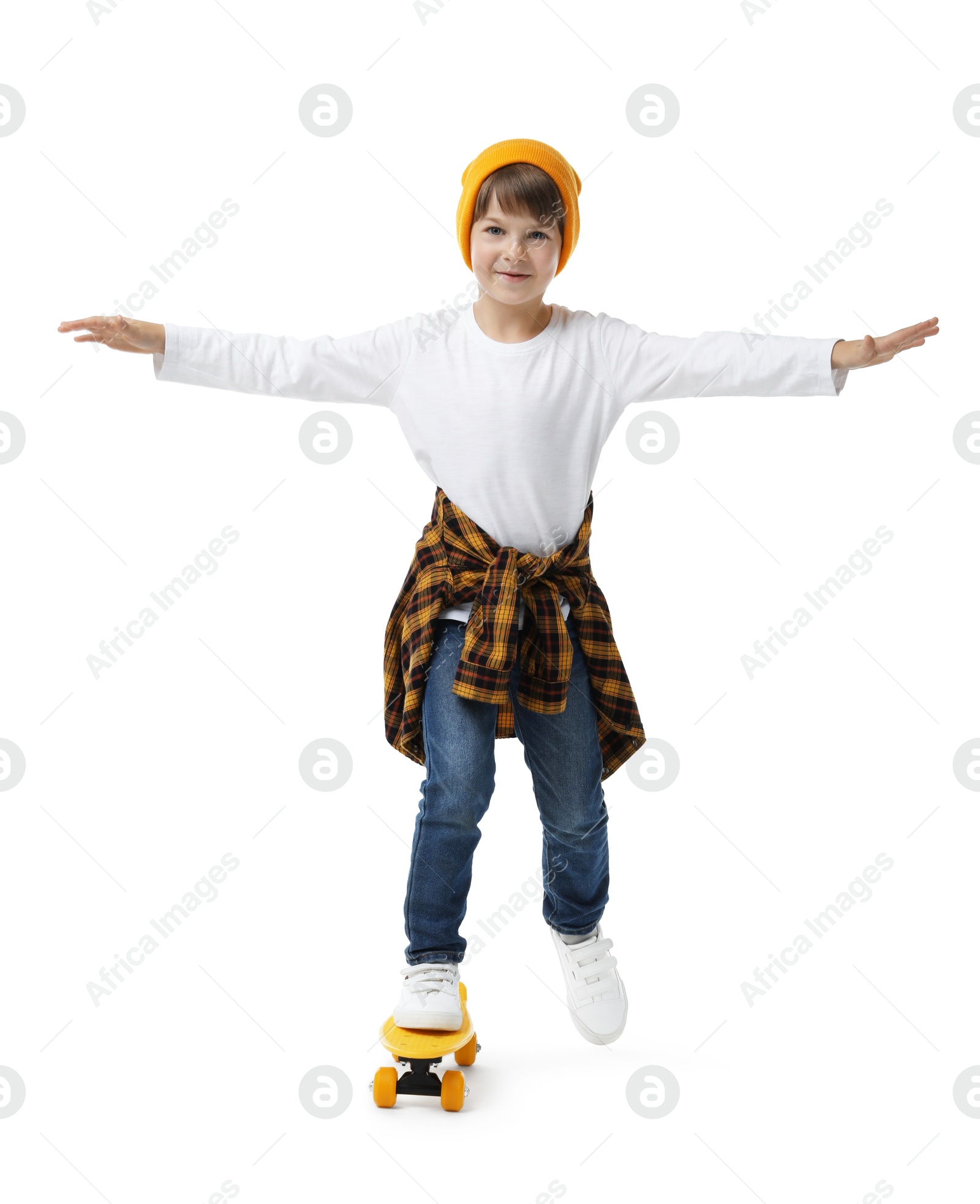 Photo of Little boy with skateboard on white background