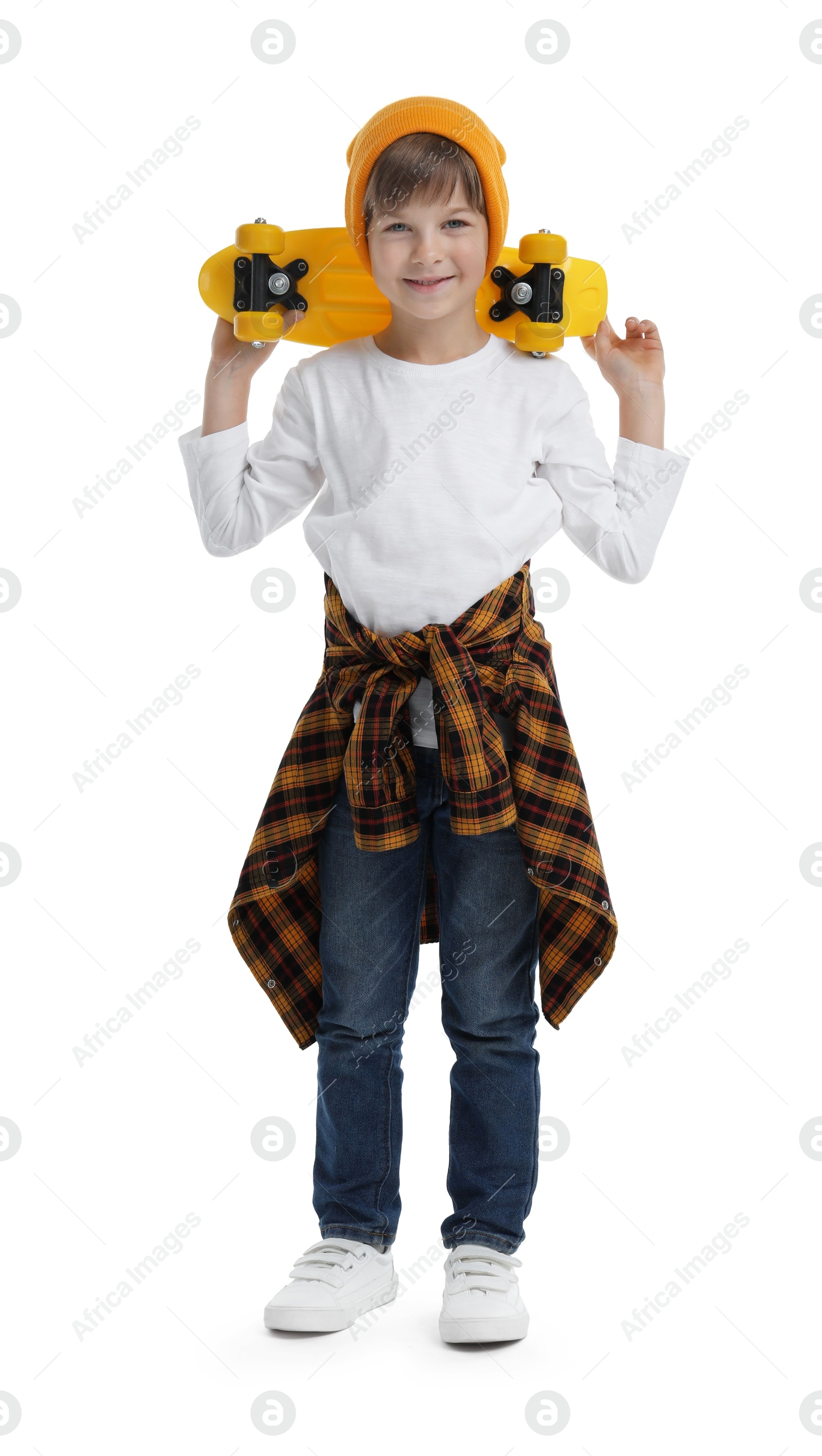 Photo of Little boy with skateboard on white background