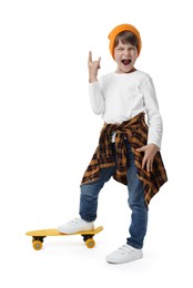 Photo of Little boy with skateboard on white background