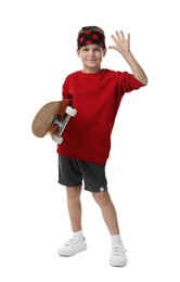 Photo of Little boy with skateboard on white background