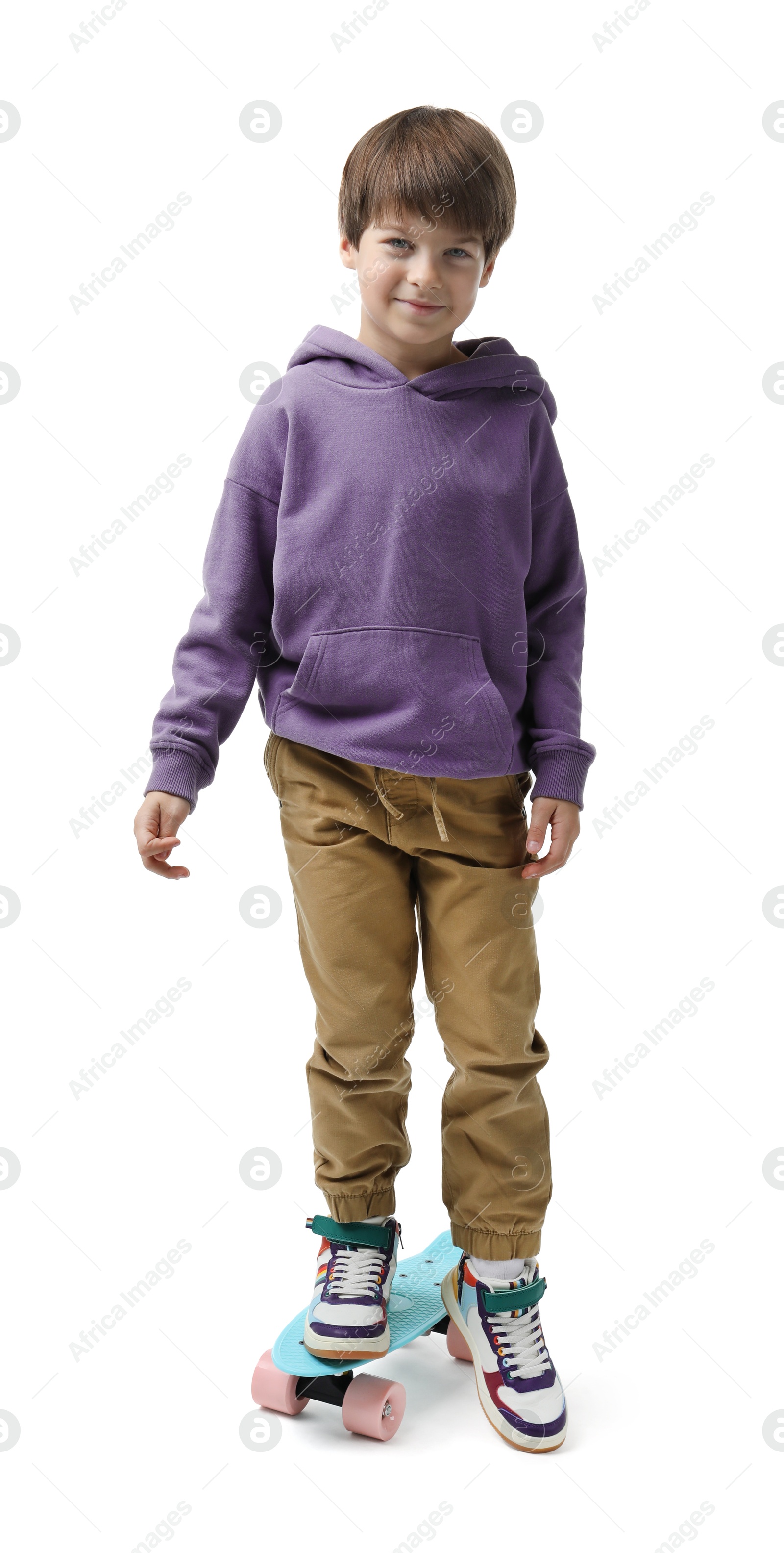 Photo of Little boy with skateboard on white background