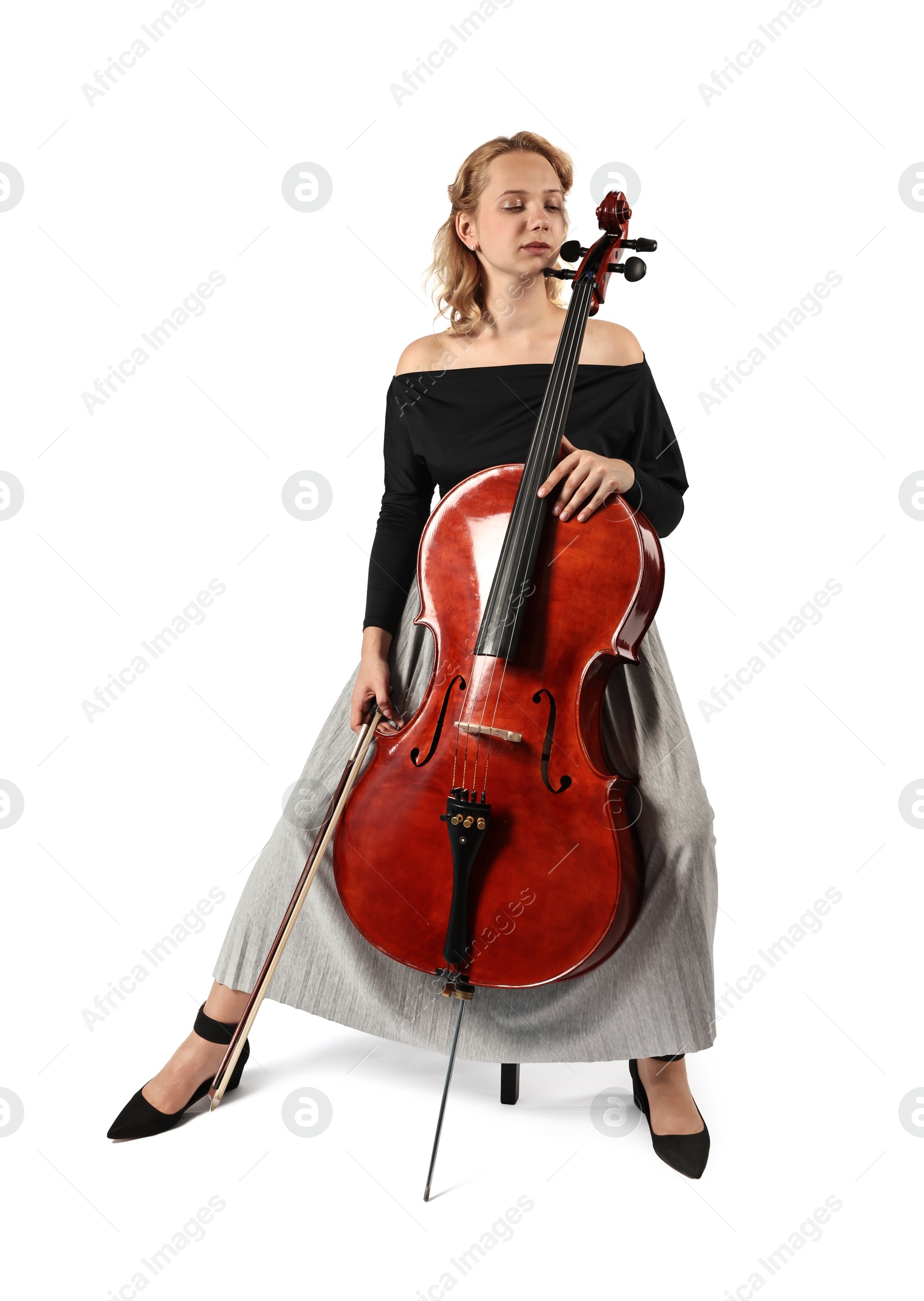 Photo of Beautiful young woman playing cello on white background