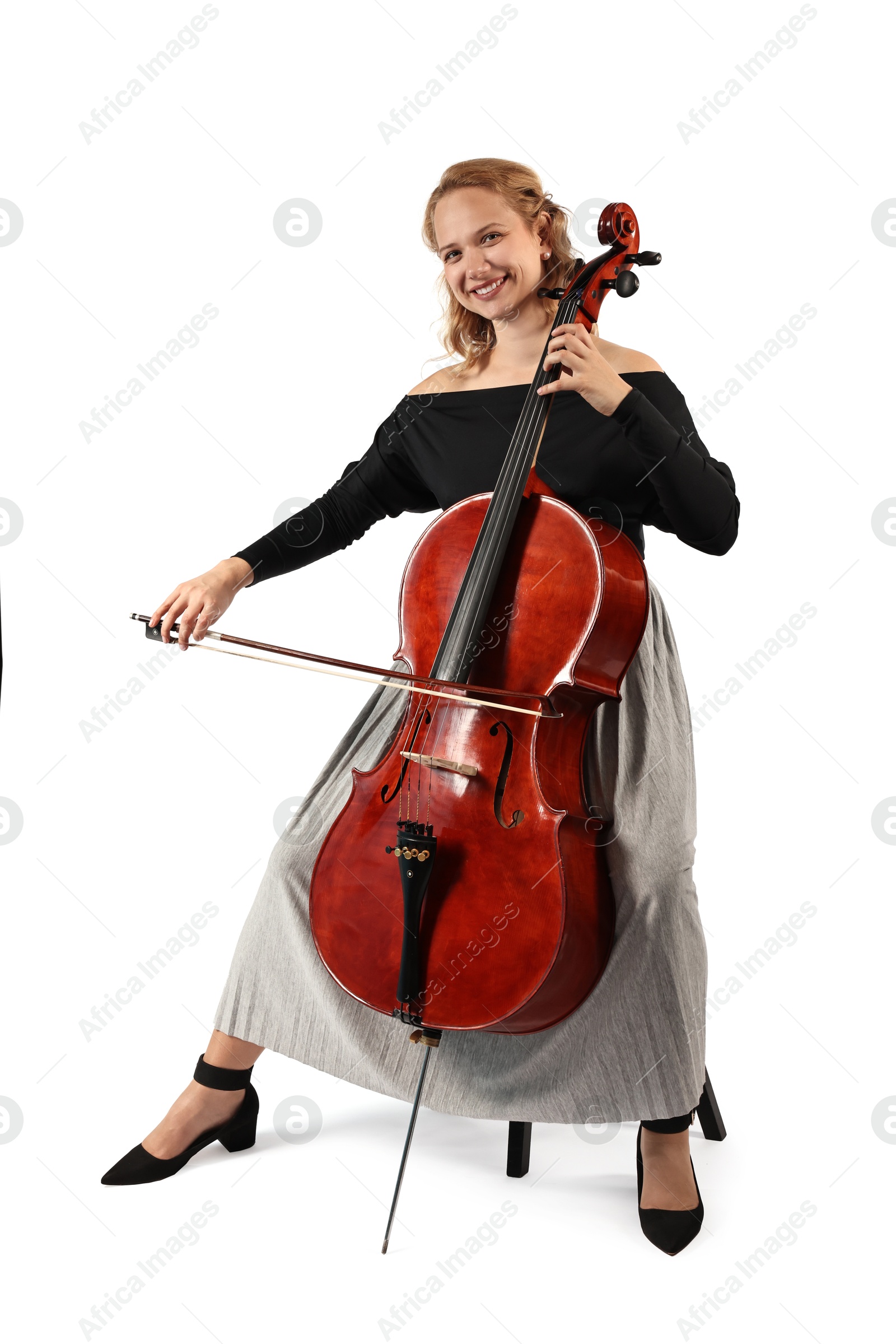 Photo of Beautiful young woman playing cello on white background