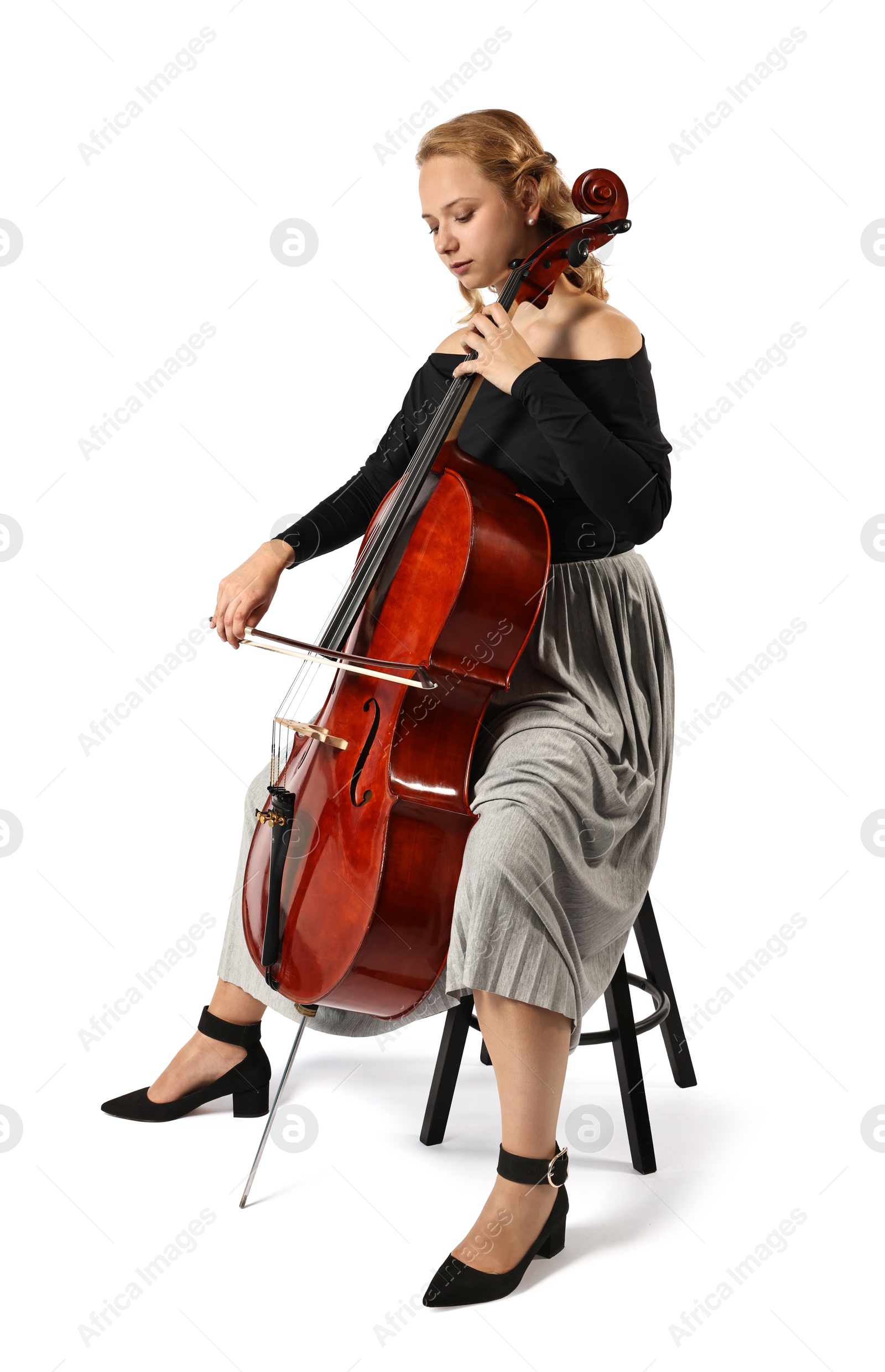 Photo of Beautiful young woman playing cello on white background