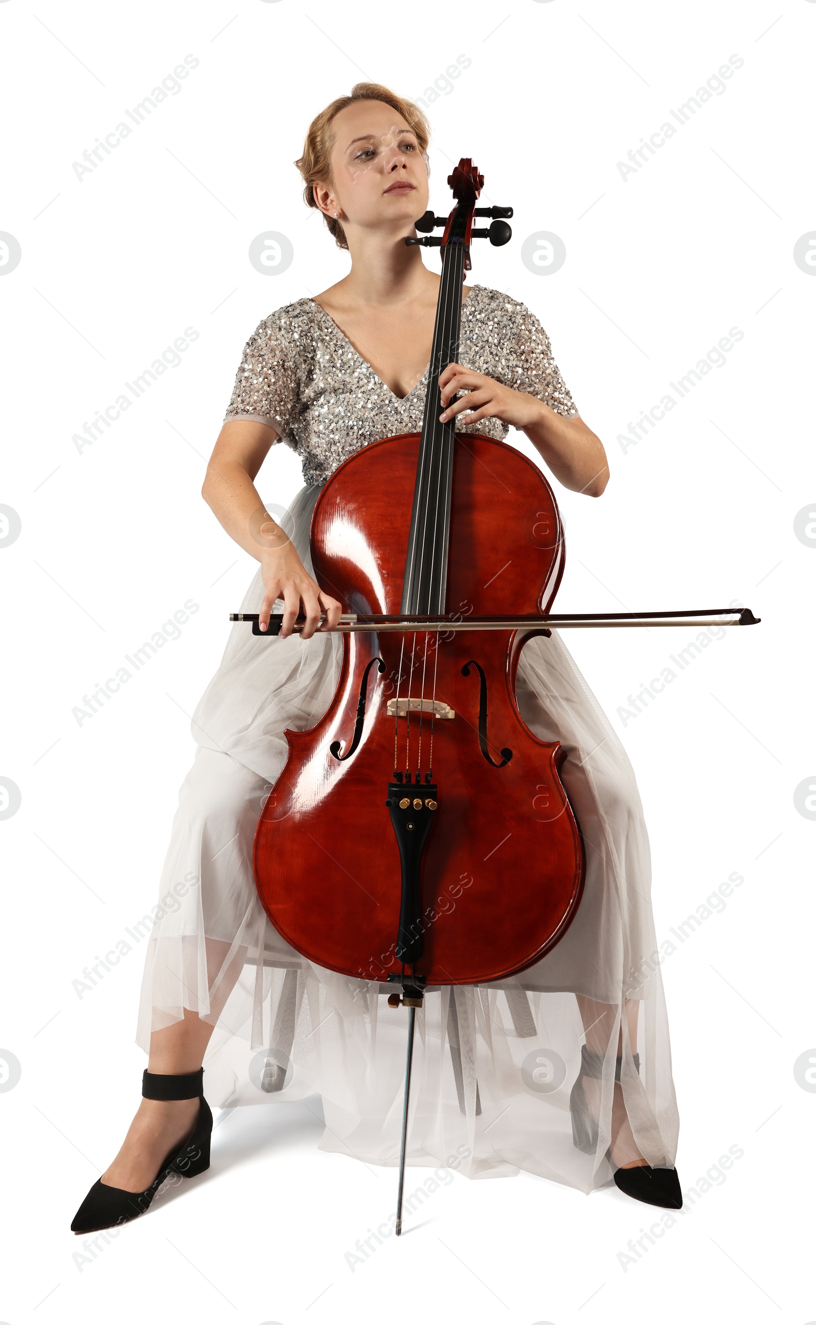 Photo of Beautiful young woman playing cello on white background