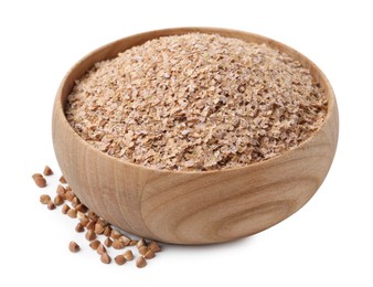 Photo of Buckwheat bran in wooden bowl and grains isolated on white