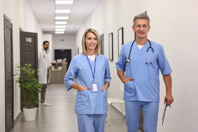 Photo of Smiling healthcare workers in hospital. Medical service